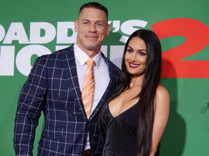  John Cena is willing to have surgery to have children with Nikki Bella. (Source: Alex Millauer / Shutterstock )