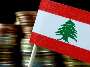 The country is unlikely to make its debt sustainable through fiscal adjustment because that would require a sharp decline in interest rates or substantial economic growth. (Shutterstock)