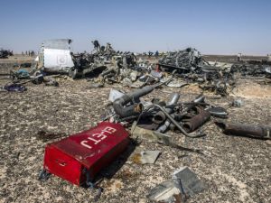 Debris belonging to Flight KGL 9268, a Russian airliner, lie strewn across the desert at its crash site near Wadi al-Zolomat, a mountainous area in Egypt's Sinai Peninsula, on Nov. 1. (AFP/Khaled Desouki)