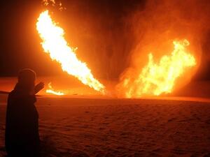 Flames rise from a pipeline in Egypt that delivers gas to Israel and Jordan after an attack by militants. (AFP/ File)