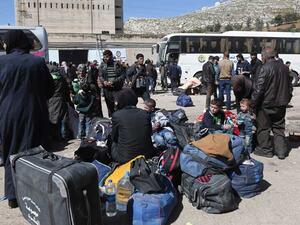 الاتفاق الجزئي يقضي بإجلاء مئات المدنيين الراغبين فقط بالخروج الى ادلب 