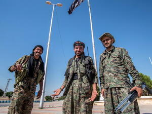 مقاتلون أكراد بعد تحرير تل أبيض -  الأرشيف