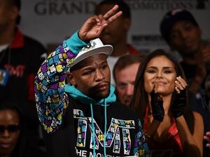 Floyd Mayweather Jr. speaks during a post-fight news conference after he retained his WBC/WBA welterweight titles in a unanimous-decision victory over Andre Berto (AFP)