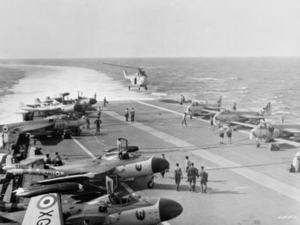 The Royal Navy aircraft carrier HMS Albion (R07) during the Suez Crisis (Wikimedia Commons)