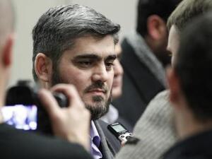 محمد علوش كبير المفاوضين في وفد المعارضة السورية الى جنيف