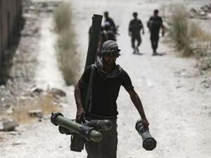 مقاتل بالجيش السوري الحر
