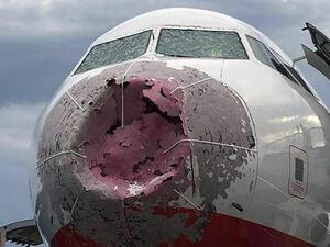 التقط عدد من الهواة وموظفي المطار لحظة الهبوط الاضطراري للطائرة 