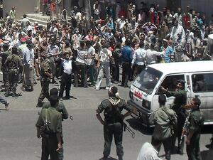 Demonstrators confront security forces during a protest against the rule of President Ali Abdullah Saleh in Yemen's southwestern city of Taiz in 2011. (AFP/File) 