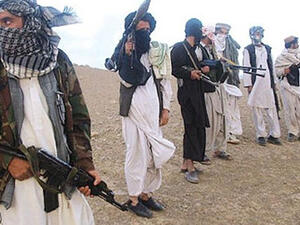 Taliban militants killed 18 Afghan soldiers, beheading eight, and possibly abducted others after they stormed an army outpost. (AFP/File)