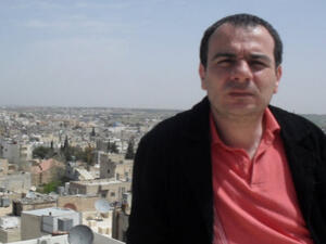 الصحفي الأردني تيسير النجار 