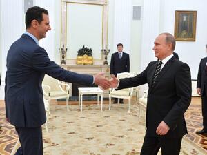 الرئيس السوري بشار الأسد مع نظيره الروسي فلاديمير بوتين في الكرملين