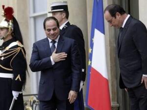 الرئيس الفرنسي فرنسوا هولاند في القاهرة مع نظيره المصري عبد الفتاح السيسي
