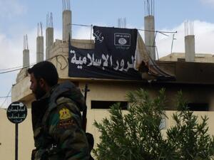 جندي سوري في تدمر بعد استعادتها من داعش
