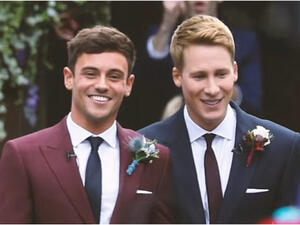 توم ديلي وزوجه داستين لانس بلاك