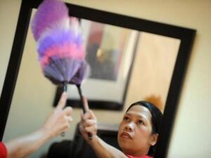 The law extends safeguards to domestic workers against physical, verbal and sexual abuse, as well as human trafficking and forced labor. (AFP/ File)