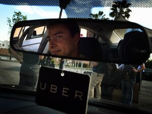 Uber has been given three dedicated areas to transport passengers to and from King Khalid International Airport.
 (Mark Ralston/ AFP)