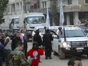 صورة لقافلة مشتركة من الامم المتحدة والهلال الاحمر العربي السوري في مدينة حمص
