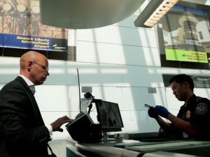 Checking for fraud at the airport. Checking for fraud at the airport.