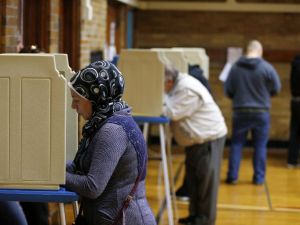 People voting at Oakman Elementary School in the US presidential election on November 8, 2016 in Dearborn, Michigan. (AFP/Jeff Kowalsky)
