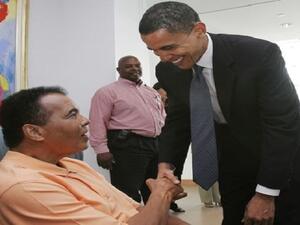 الرئيس الأميركي، باراك أوباما واسطورة الملاكمة محمد علي