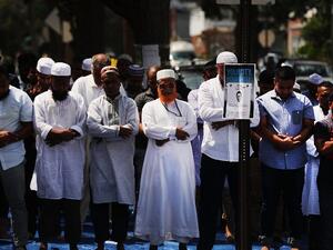 The Muslim community in New York gathers for prayer after an imam and his assistant were shot leaving a mosque in Queens. (AFP/File)