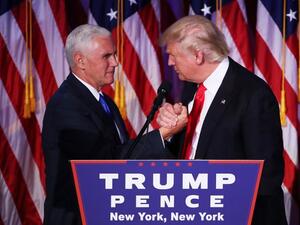 Vice president-elect Mike Pence and Republican president-elect Donald Trump shake hands during his election night event at the New York Hilton Midtown in the early morning hours of November 9, 2016 in New York City. (AFP/Mark Wilson)