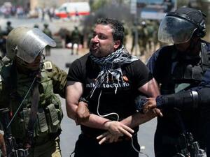 Palestinian led by Israeli soldiers  (Twitter)