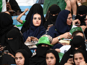 Women will be permitted inside sports stadiums at the start of 2018 (AFP/File)