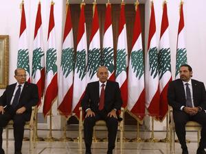 Lebanese prime minister Saad Hariri (R) meets President Michel Aoun (L) and Parliament speaker Nabih Berri(C) at the presidential palace in Baadba. (AFP/ File Photo)