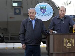 Israeli Prime Minister Benjamin Netanyahu and former Defense Minister Moshe Ya'lon. (AFP/File)
