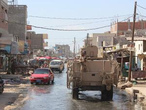 Forces loyal to the Saudi-backed Yemeni president patrol a street in the southern city of Lahj on April 24, 2016 during an operation to drive Al-Qaeda fighters out of the southern provinces. (AFP/Salah al-Obeidi)