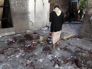 Houthi rebels check the Balili Mosque in the capital Sanaa, following an explosion on Sept. 24, 2015 on the first day of Eid al-Adha. (AFP/Mohammed Huwais)