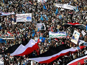 Yemenis protest against a Saudi-led coalition which supports various factions aligned with Yemen's internationally recognised government against Huthi rebels. (AFP)