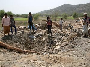 Yemenis look at the damage following reported Saudi-led coalition air strikes on October 27, 2016 in Khamis Bani Saad district in al-Mahwit governorate. (AFP/Stringer)