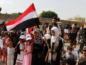 Yemeni children demonstrate against the removal of the Saudi-led coalition from the United Nations annual child rights blacklist, in front of United Nations (UN) office in Sanaa, on June 15, 2016. (AFP/Mohammed Huwais)