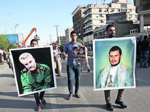 The Saudi-led coalition is battling Shia Houthis, led by Abdul-Malik al-Houthi (right) and is said to be backed by Iranian forces under the command of General Qassem Suleimani (left). (AFP/Ali Al-Saadi)