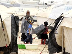 According to official figures, the overall number of registered and unregistered Syrian refugees in the Kingdom stands at about 1.3 million (AFP/File)