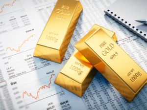 Stocks worldwide mixed as gold prices edge higher