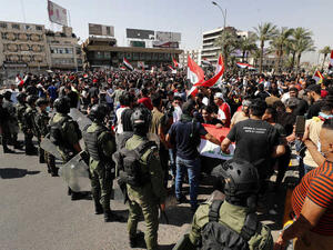 اشتباكات بين قوات الأمن ومحتجين في بغداد