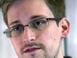 بوتين يمنح سنودن الجنسية الروسية