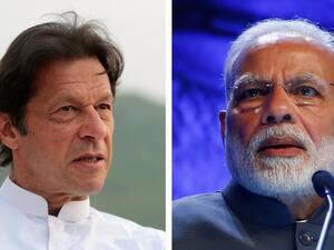 عمران خان (يسار) ونظيره الهندي ناريندرا مودي