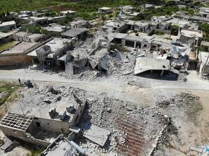 Destruction in the village of Kansafrah following reported shelling on the rebel-held Idlib province  (AFP)