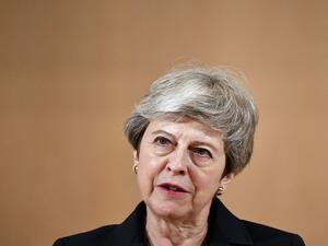 Britain's outgoing Prime Minister Theresa May delivers a speech at the ILO International Labour Conference on June 11, 2019 in Geneva.  FABRICE COFFRINI / AFP
