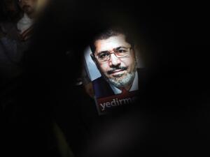  A poster of Egypt's President Mohamed Morsi is seen during a pro-Morsi demonstration in Istanbul (AFP)