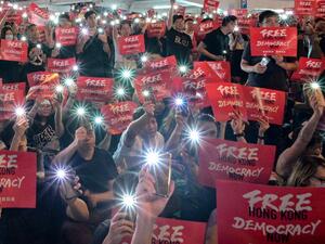 Protesters gather as they rally against a controversial extradition bill in Hong Kong (AFP)