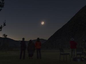 People watch the total solar eclipse from El Molle, Chile, on July 2, 2019. Tens of thousands of tourists braced Tuesday for a rare total solar eclipse that was expected to turn day into night along a large swath of Latin America's southern cone, including much of Chile and Argentina. Stan HONDA / AFP