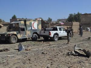 Afghan security personnel arrive at the site of a car bomb attack that targeted an intelligence unit in Ghazni  (AFP)