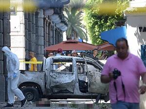 The first attack targeted a police patrol in Charles de Gaulle Street in central Tunis  (AFP)