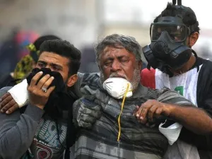  ميليشيا الزعيم الشيعي مقتدى الصدر شاركت قوات الأمن العراقية في تفريق متظاهري الخلاني