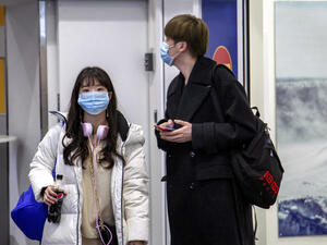 الصين تطلق إجراءات وقائية مشددة للحد من انتشار كورونا